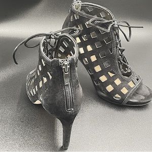 Via Spiga black heels - tie in the front; zip in the back.